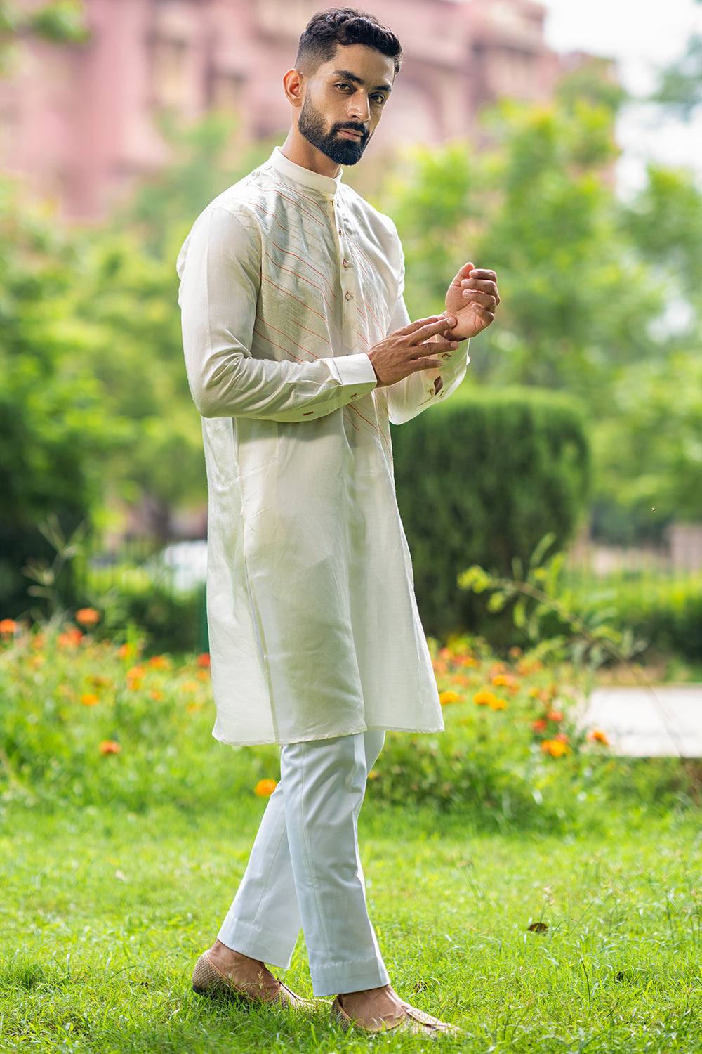 Ivory Kurta With Diagonal Orange And Ivory Threadwork Detailing