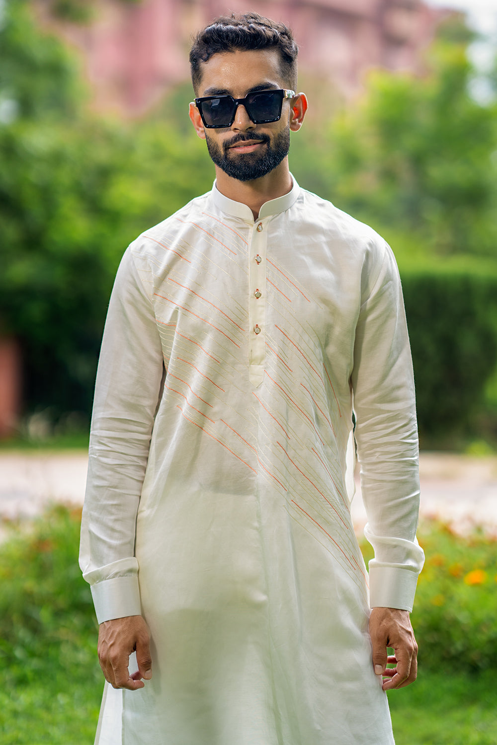 Ivory Kurta With Diagonal Orange And Ivory Threadwork Detailing