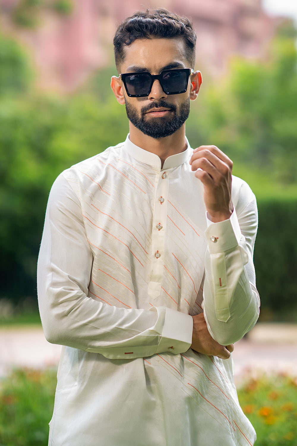 Ivory Kurta With Diagonal Orange And Ivory Threadwork Detailing